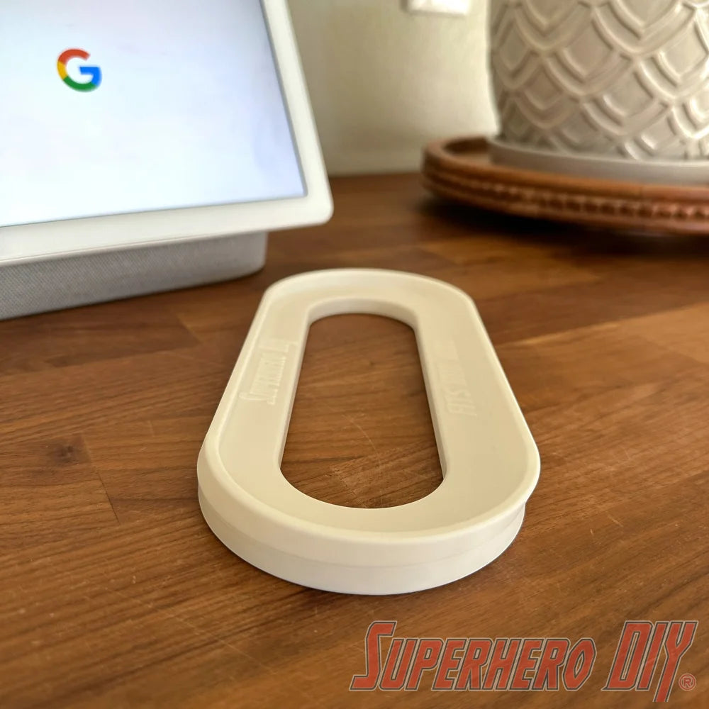 Google Nest Hub Max riser stand on a wooden counter in a kitchen setting, designed to protect smart display from splashes and condensation.