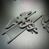 Army medical badge display featuring caduceus and Geneva cross with wings, representing medical insignia.