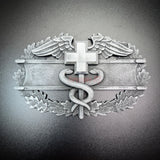 Army medical badge display insignia featuring a caduceus and Geneva Convention cross.