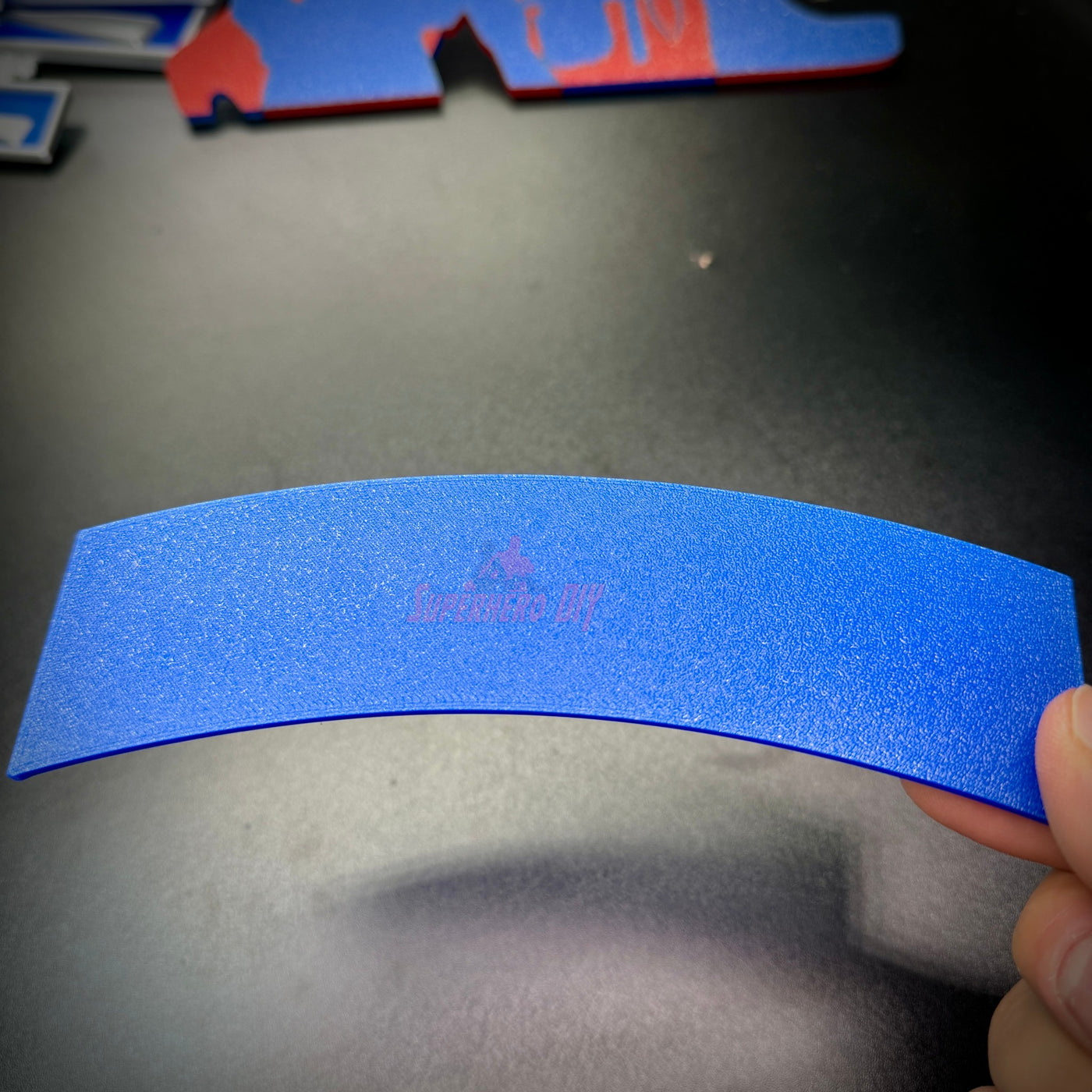3D mountain tab wall display piece in blue, showcasing smooth texture and curved design, perfect for wall decor.