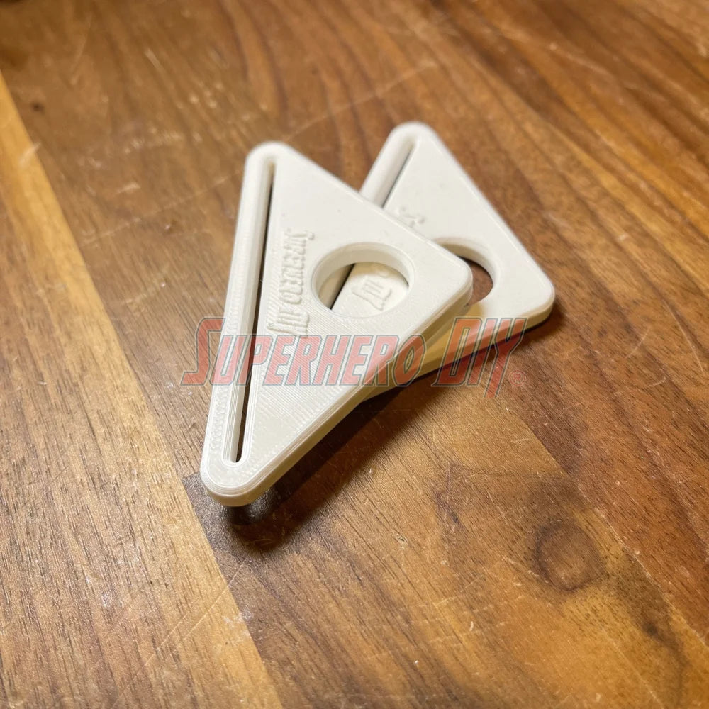 Simple Tube Squeezer for easy product dispensing from standard tubes, shown on a wooden surface.