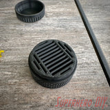 Durable SD card travel case with tire tread design, provides rugged protection and organized storage for memory cards while traveling