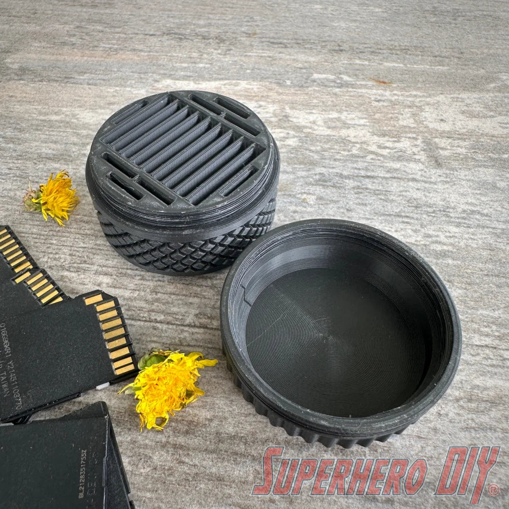 Durable SD card travel case with tire tread design, provides rugged protection and organized storage for memory cards while traveling