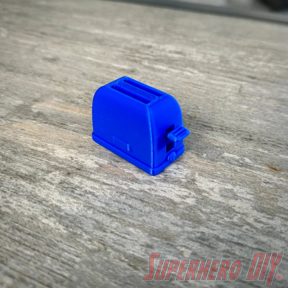 Mini toaster-shaped SD card holder that stores 2 memory cards and doubles as a fun desktop fidget