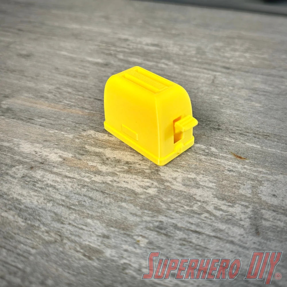 Mini toaster-shaped SD card holder that stores 2 memory cards and doubles as a fun desktop fidget