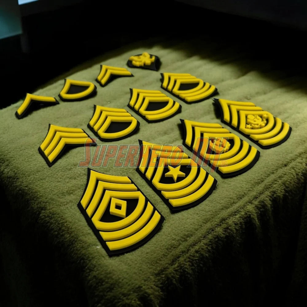 Army enlisted rank insignia displayed in multiple sizes on a green background, showcasing various enlisted ranks.