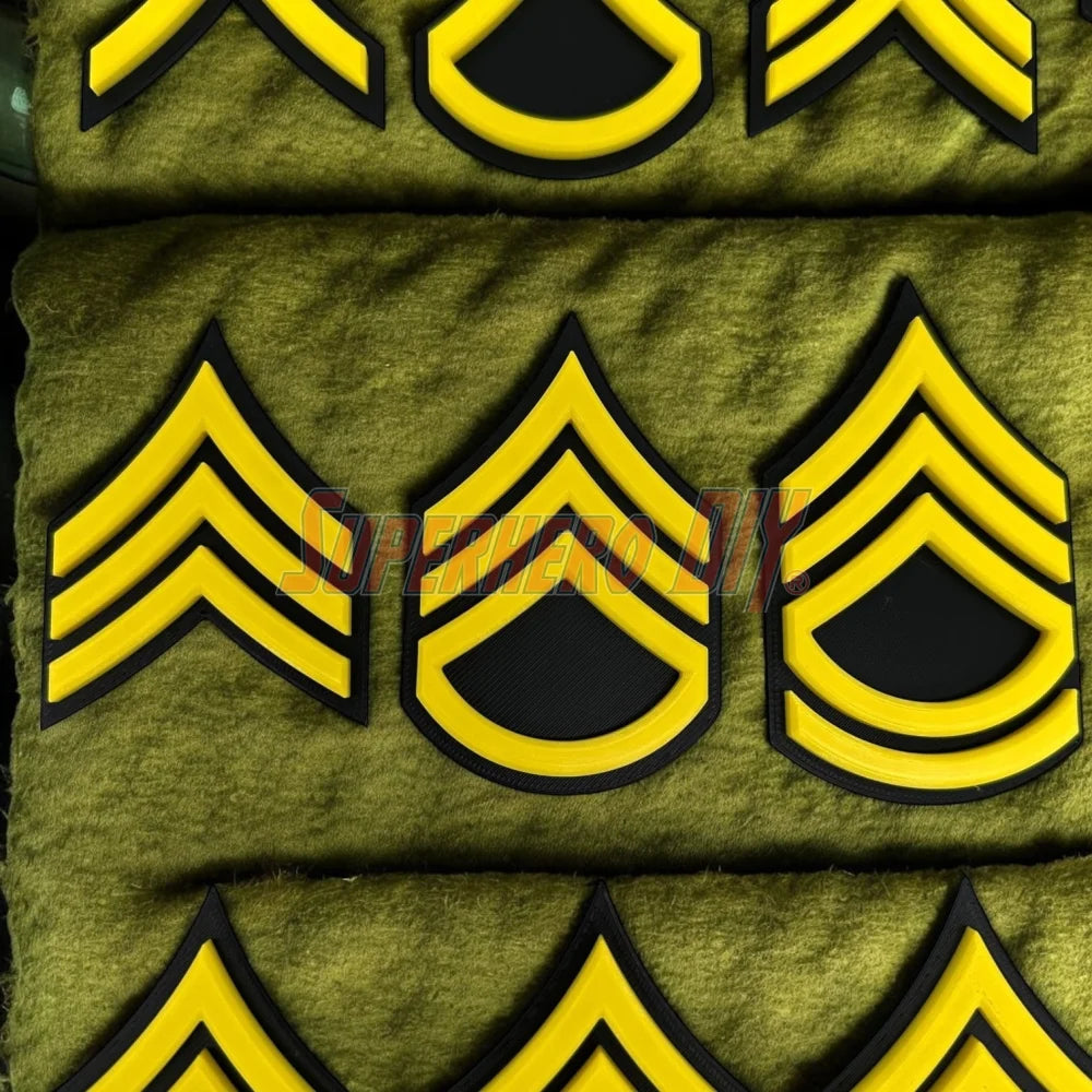 Army enlisted rank insignia in yellow and black, showcasing multiple ranks for military display.