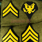 Army enlisted rank insignia featuring 3D-printed yellow and black sergeant stripes and eagle emblem.