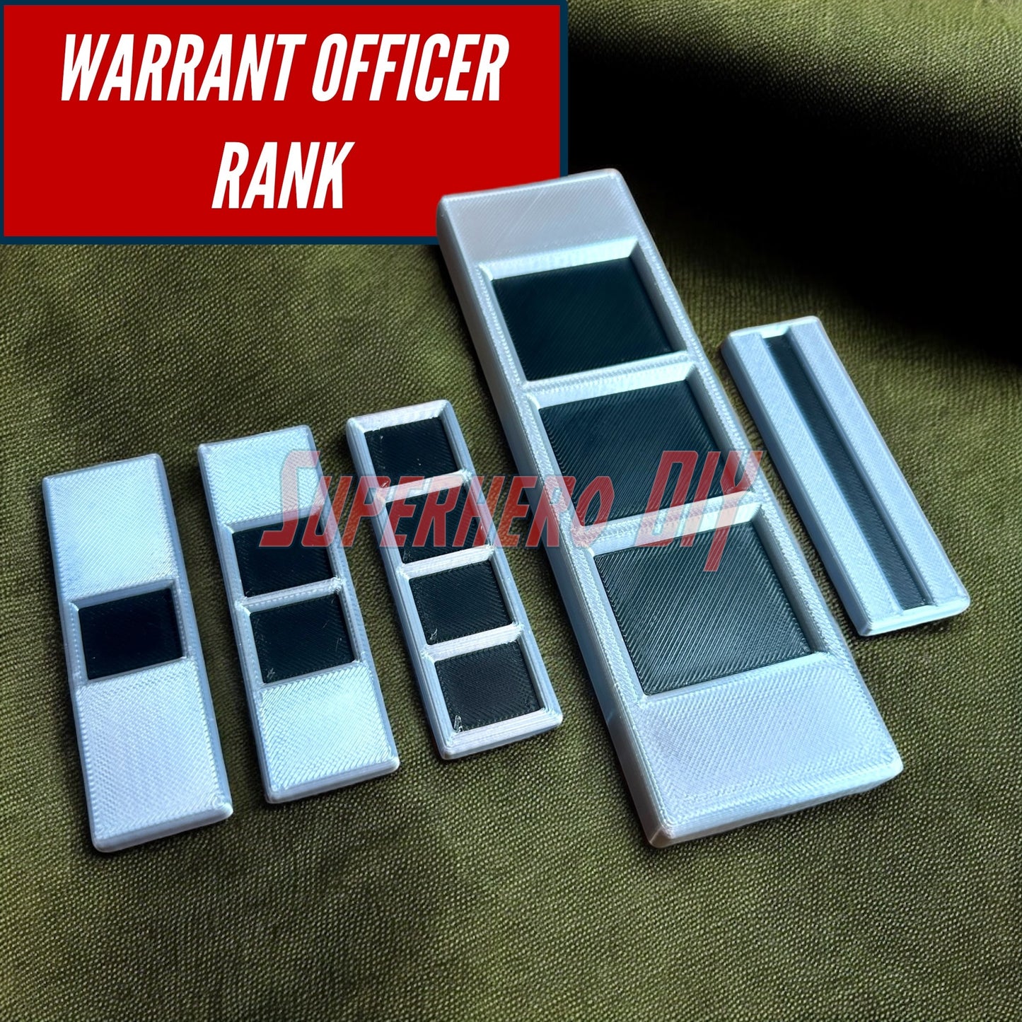 3D replica of US Army Warrant Officer Rank Insignia in varying sizes from 2 to 12 inches, detailed in black and silver.