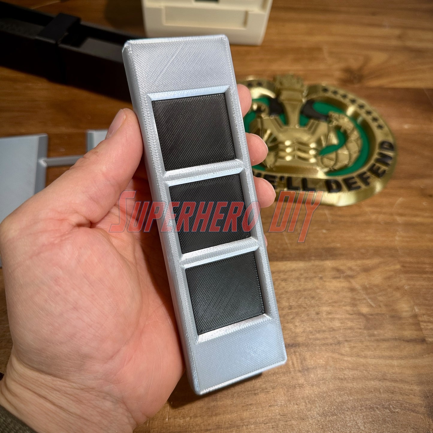US Army Warrant Officer Rank Insignia 3D Replica in hand, black and silver, showcasing military legacy, multiple sizes available.