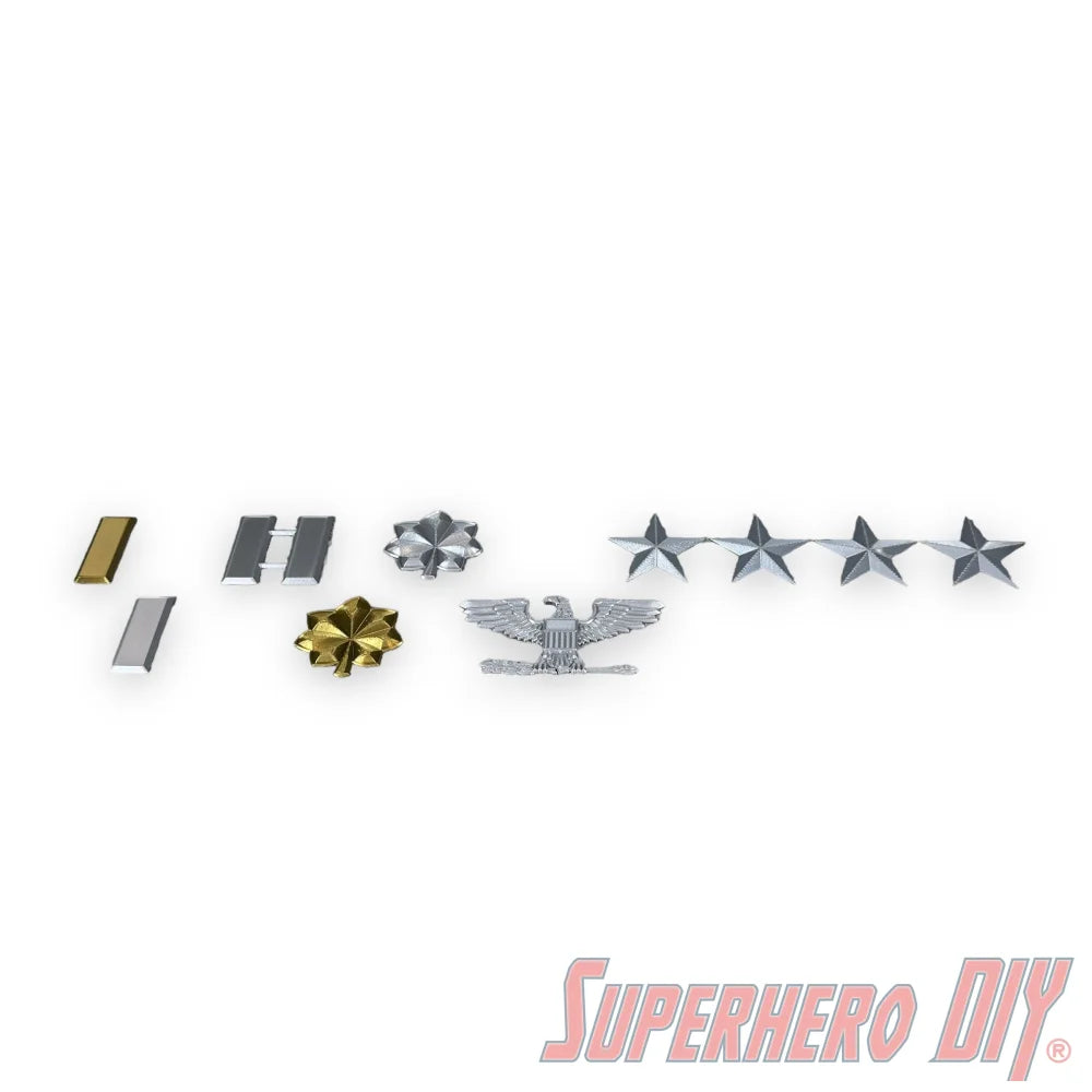 Set of US military officer rank insignia including gold and silver bars, oak leaf clusters, eagle emblem, and silver stars. - SuperheroDIY