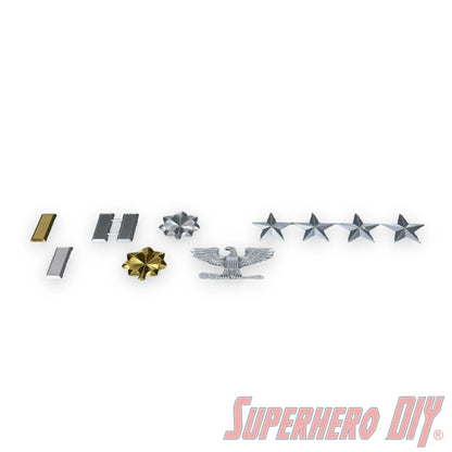 Set of US military officer rank insignia including gold and silver bars, oak leaf clusters, eagle emblem, and silver stars. - SuperheroDIY