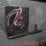 Floating shelf for movies or video games displaying a superhero-themed Blu-ray with included command strip on a wall.