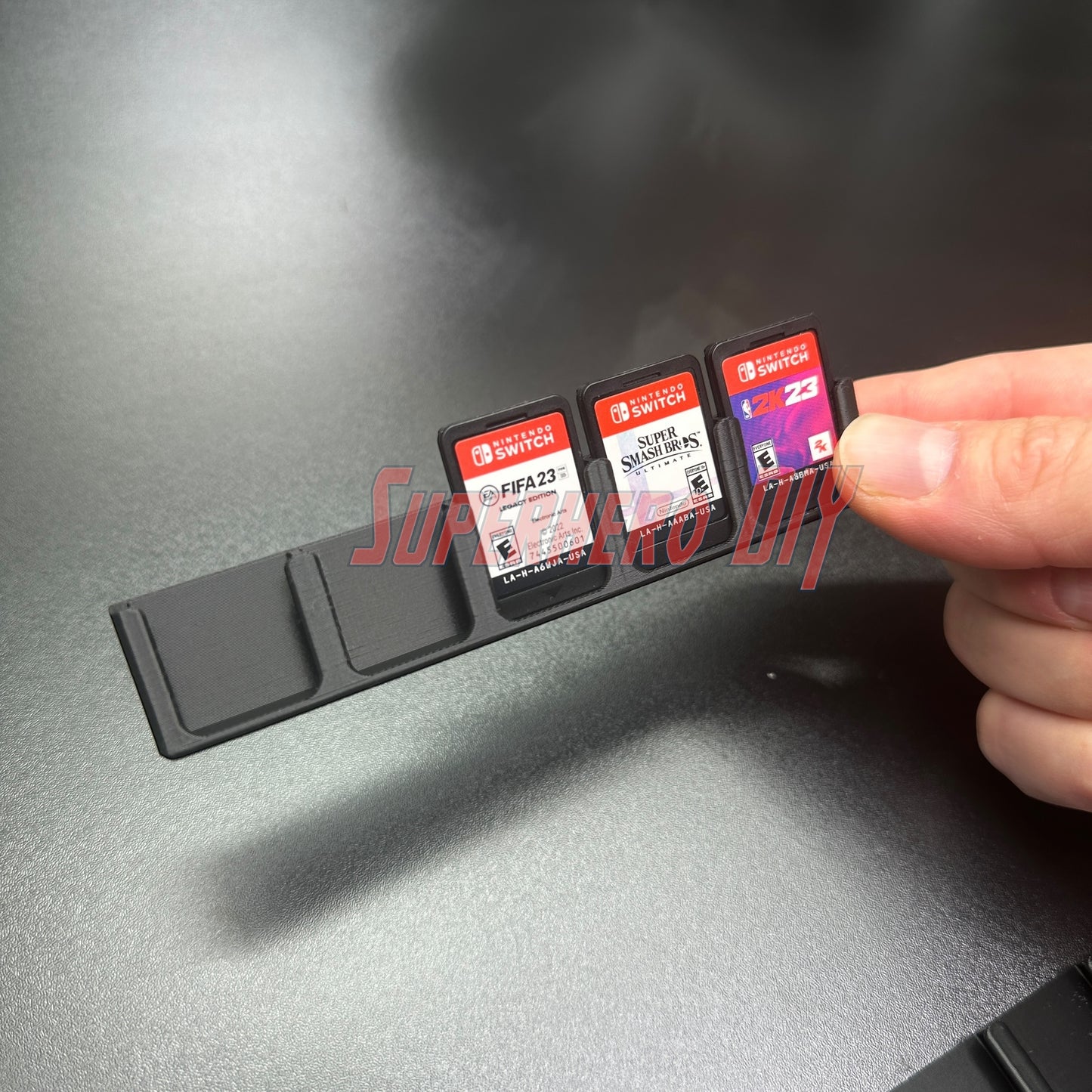 Game Cartridge Holder for Nintendo Switch – 5 or 10 Slot Display Rack with Nintendo Switch cartridges.