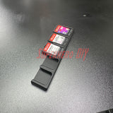 Game Cartridge Holder for Nintendo Switch – 5 or 10 Slot Display Rack with game cartridges displayed on a black surface.