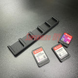 Game Cartridge Holder for Nintendo Switch – 5 or 10 Slot Display Rack with game cartridges displayed.