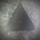 Smooth flat black back of the NTC display insignia, ready for wall mounting