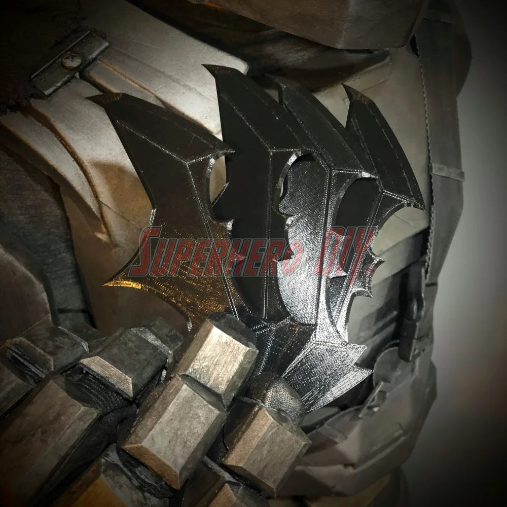 BvS JL batarang prop 3D-printed in PLA plastic for cosplay, shown in black finish on costume armor.