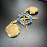 Chemical Corps insignia display showcasing a cobalt blue benzene ring on gold retorts against a black background.