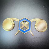Chemical Corps insignia featuring a cobalt blue benzene ring and crossed gold retorts on a flat background.