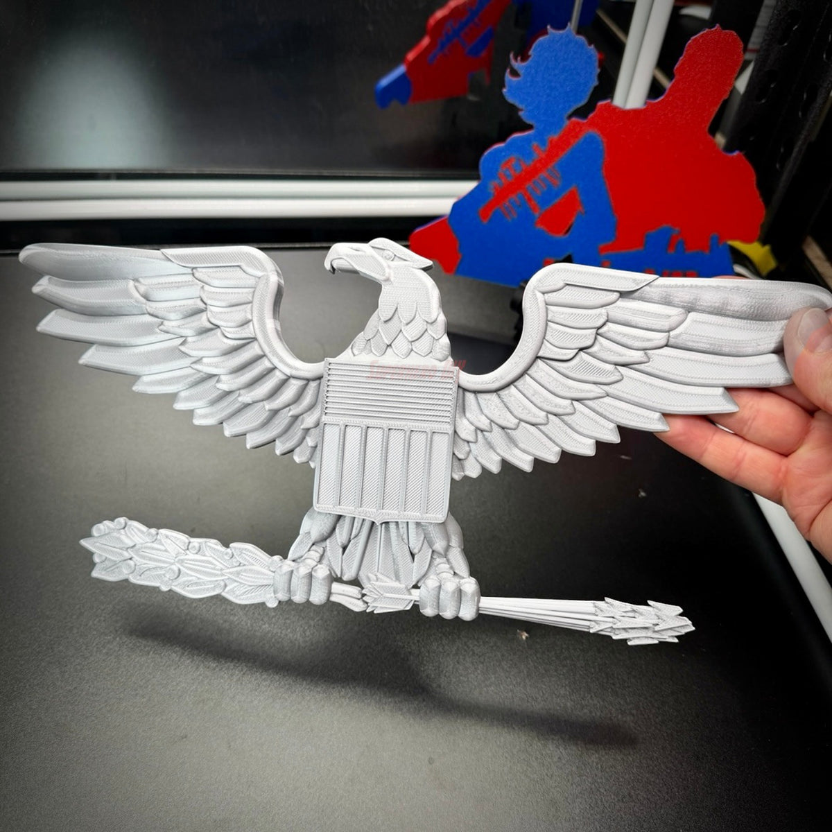 Colonel Captain rank insignia displayed as a detailed eagle design holding a branch, ideal for military collectors.