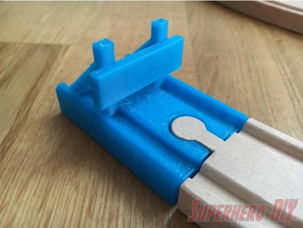 Blue train buffer END stop for wooden train tracks, compatible with BRIO and Thomas sets, providing a realistic end of the line