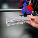 Expert Soldier Badge display insignia with M9 bayonet feature, showcasing expert soldier badge in silver design.