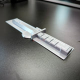 Expert Soldier Badge display with a replica M9 bayonet on a sleek surface, showcasing expert soldier badge detail.