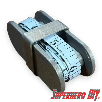 Check out the Fabric Measuring Tape Holder | Roll up your sewing tape measure with ease with this fabric tape measure holder! from Superhero DIY! The perfect solution for only $5.39