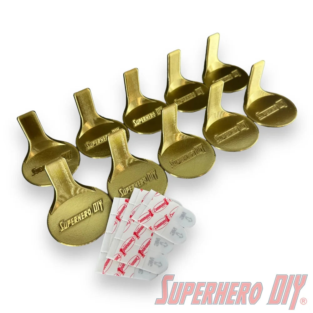 Superhero DIY floating figure shelves in gold color for Funko Pop wall displays, 3D-printed in durable plastic