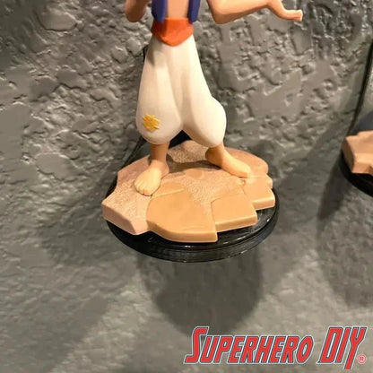 Check out the Floating Shelf for Disney Infinity | Comes with Command Strips from Superhero DIY! The perfect solution for only $2.29