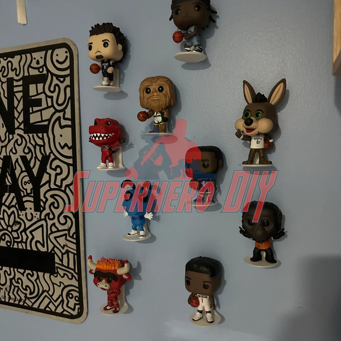 Floating shelves for Funko Pops showcasing collectible vinyl figures on a wall.