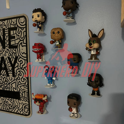 Floating shelves for Funko Pops showcasing collectible vinyl figures on a wall.