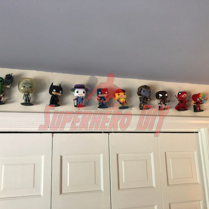 floating shelves for funko pops displaying collectible figures above a doorway