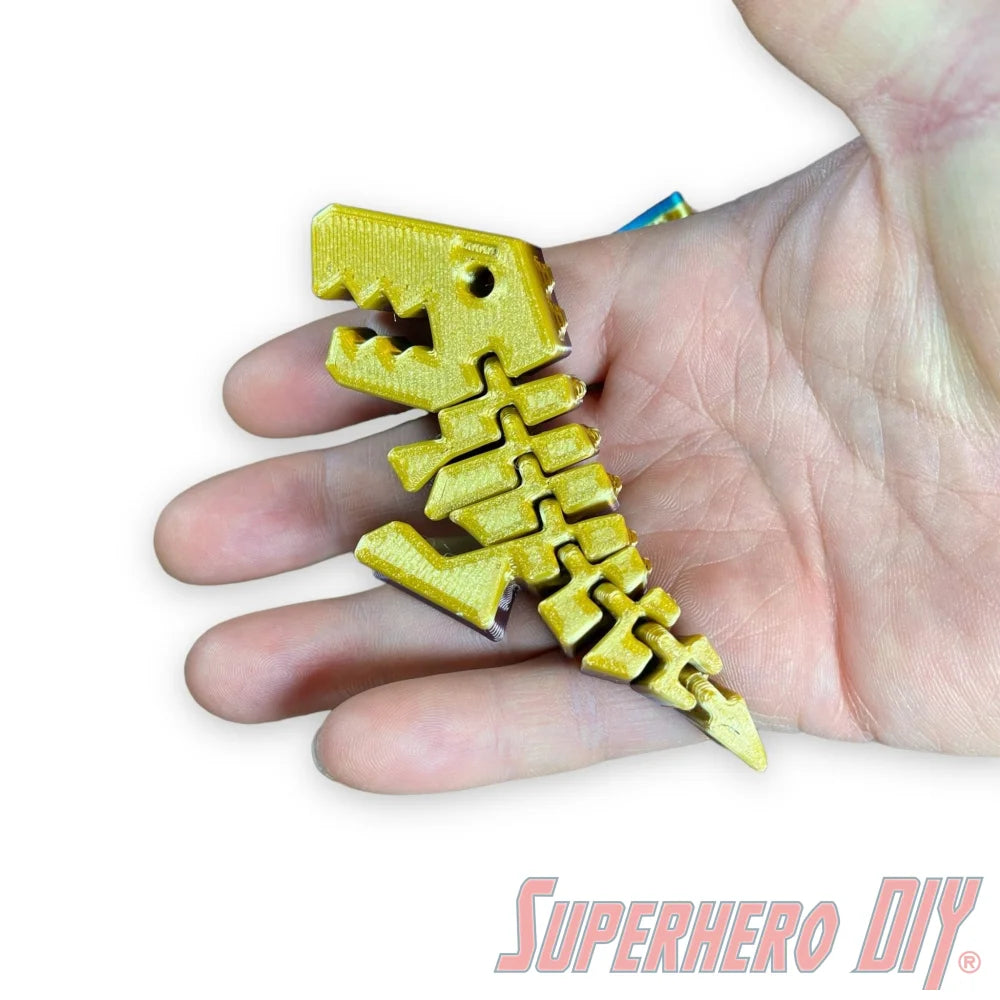 Check out the Fun T-Rex Fidget Toy | It's a Flexi Rex articulated T-rex! | Great for busy hands or as a stress-relieving simple toy from Superhero DIY! The perfect solution for only $3.41