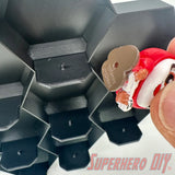 Organizing Disney Doorables on a Honeycomb Wall Display for Disney Doorables with removable foot pegs.