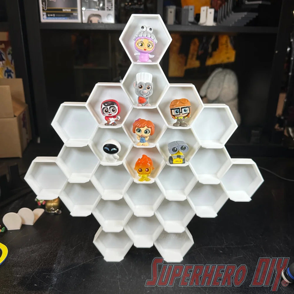 Honeycomb Wall Display for Disney Doorables: Organize and Showcase Your Collection with figures displayed in a hexagonal pattern.