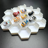 Creative honeycomb display for 19 Disney Doorables showcasing collectible figures in a unique arrangement on a 3D-printed holder.