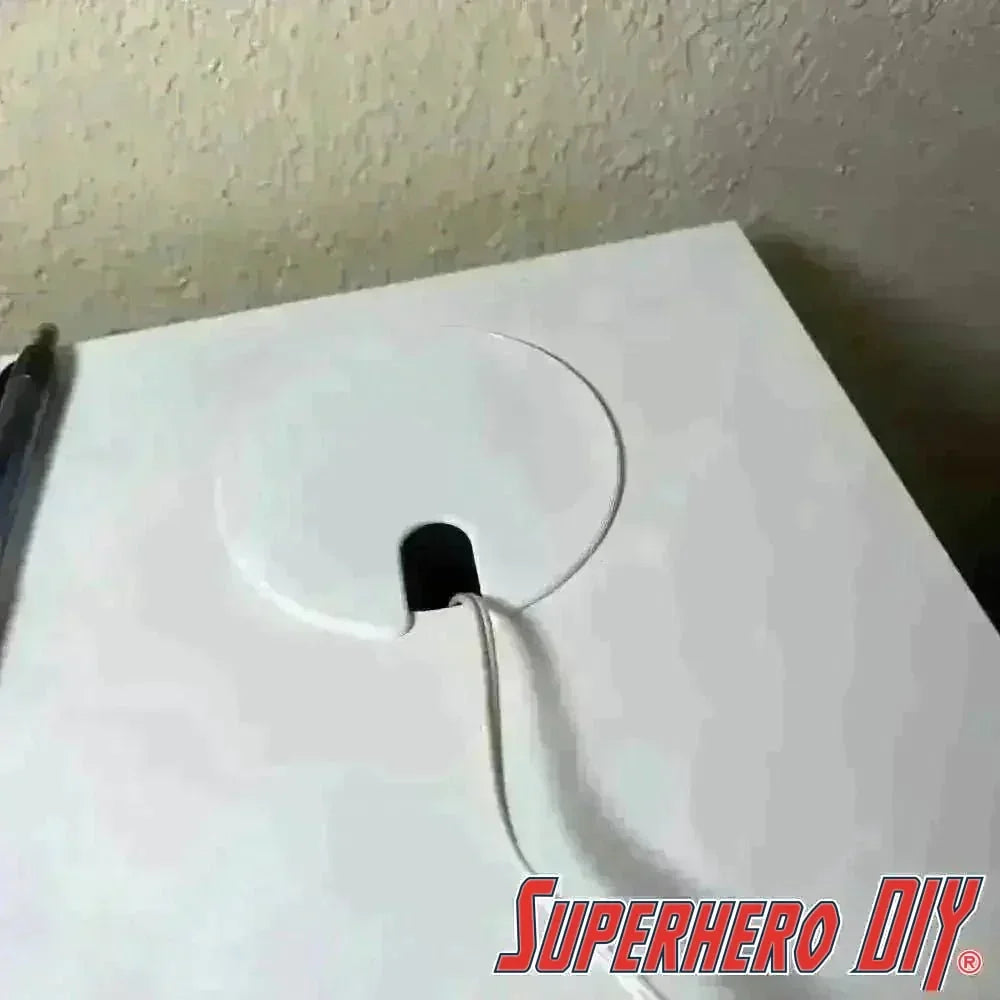 Check out the IKEA MICKE desk hole cover | Fits right into open wiring hole | Multiple colors from Superhero DIY! The perfect solution for only $5.39