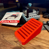 CFexpress Type B card organizer with 8-slot stepped desk holder for easy card access on a wooden surface.