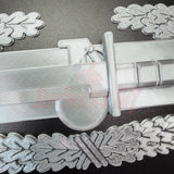 Combat Action Badge Display Insignia with engraved details and intricate designs on a black background.