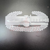 Combat Action Badge display insignia with a bayonet and oak wreath, perfect for wall or desk display.