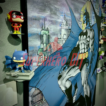 Rotating Shelf for Jim Lee Batman (HUSH) Funko Pop displayed on a wall-mounted bracket with Batman art in the background.