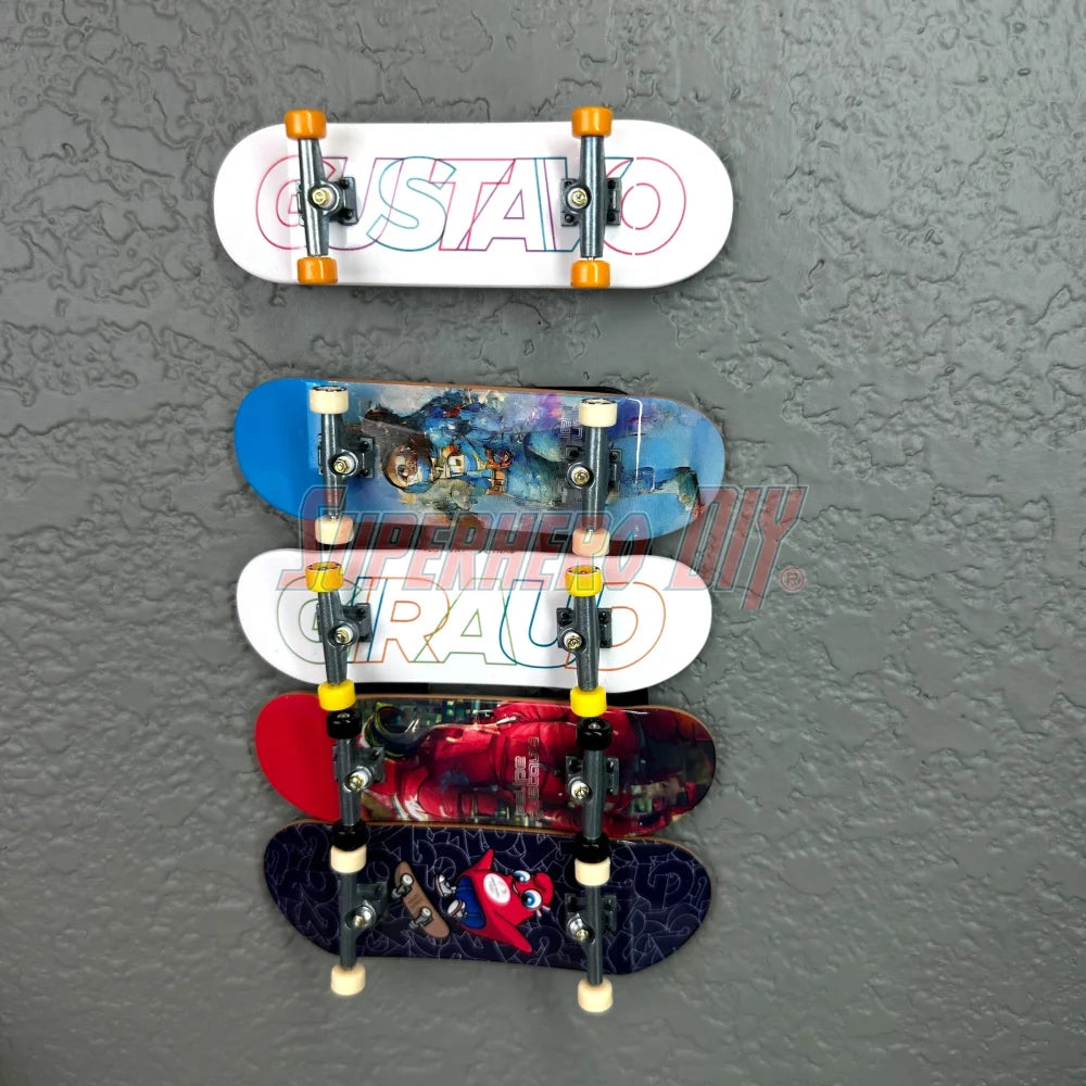 Tech Deck fingerboards displayed on magnetic wall-mounted rack, artwork facing outward