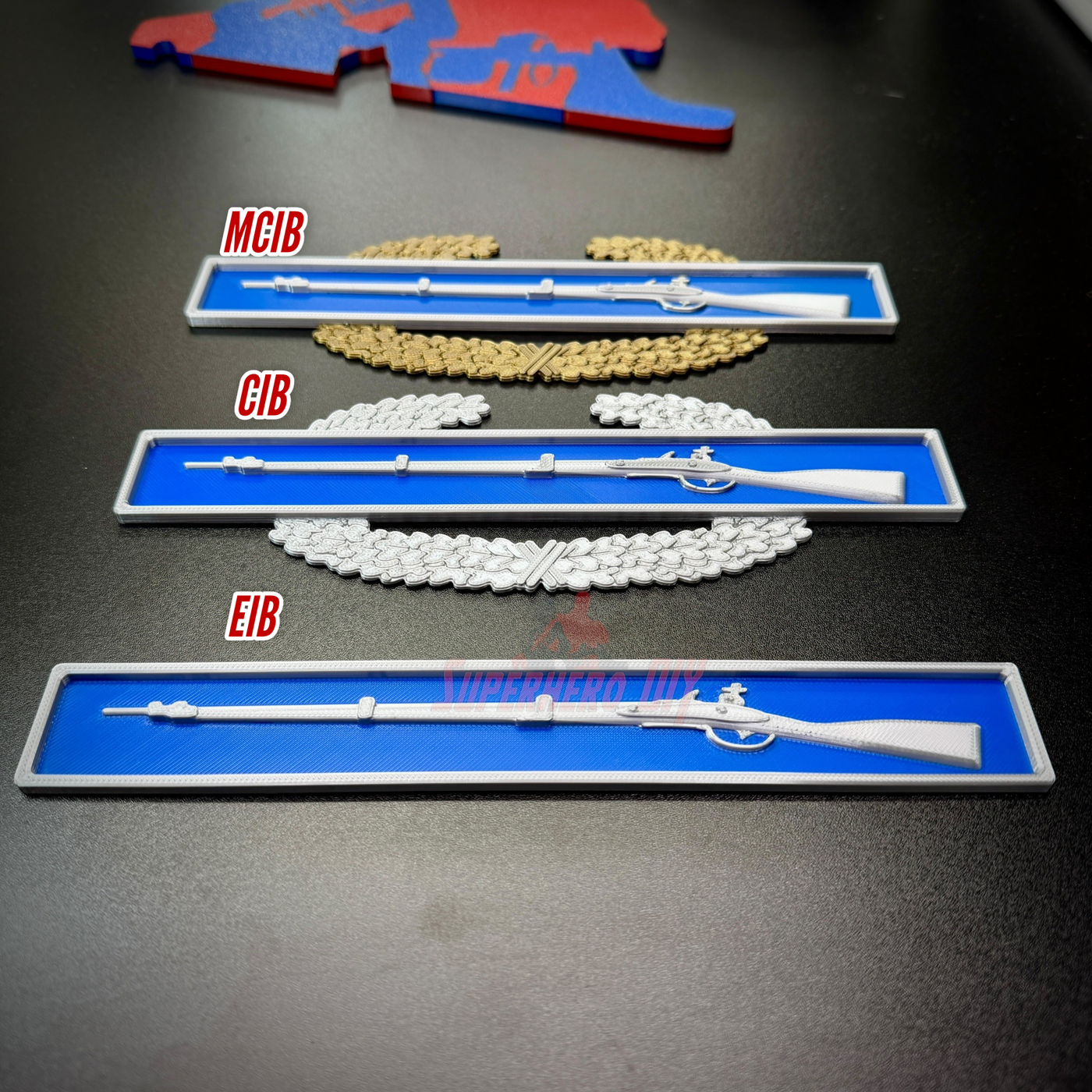 Expert Infantryman Badge (EIB), Combat Infantryman Badge (CIB), and Master Combat Infantryman Badge (MCIB) display