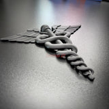 Army medical corps caduceus wall display in gray, featuring twin serpents and wings, ideal for wall decor.