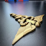 Army Medical Corps caduceus wall display in gold, featuring twin serpents and wings, detailed design for wall decor.