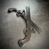 Black crossed pistols representing army military police insignia, showcasing detailed flintlock design.