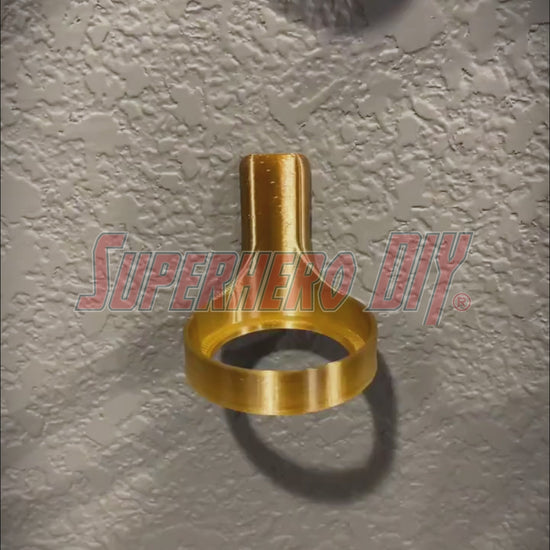 3D-printed brass-colored wall mount by Superhero DIY