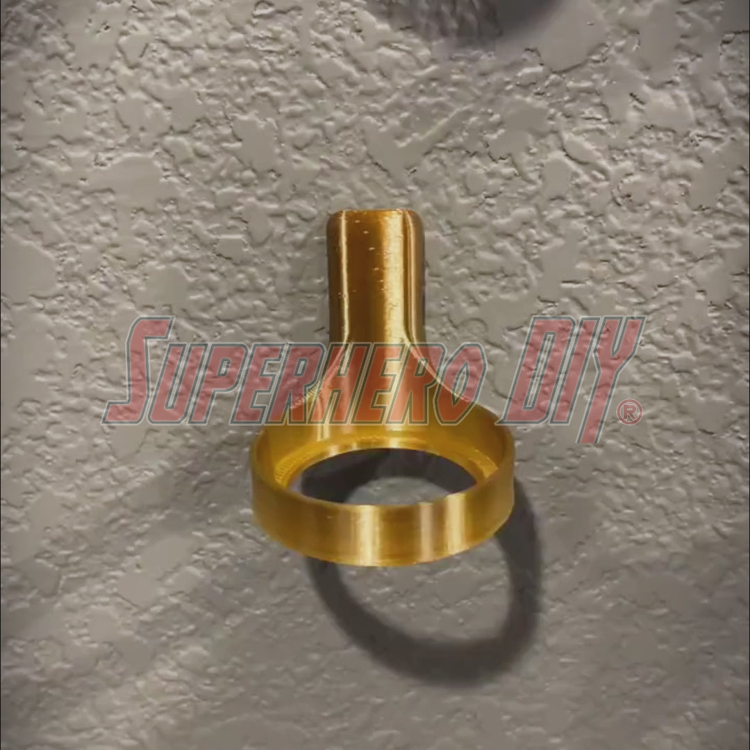 3D-printed brass-colored wall mount by Superhero DIY